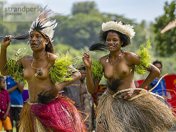 Six different groups of native warriors  drummers  and dancers perform on Kwato Island  Papua New Guinea  Pacific