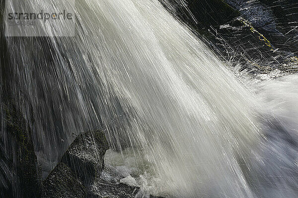 Waterfall shot with a slow shutter speed  resulting in blurred motion  at Welcombe Mouth  Hartland  north Devon  England  United Kingdom  Europe