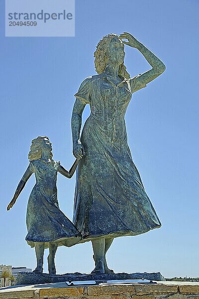 Sculpture L'Esperance by Ali Salem 2014  two  woman  child  girl  hold  hand  head  arm  up  look  look  bronze  cut out  Le Grau-du-Roi  Camargue  Provence  France  Europe