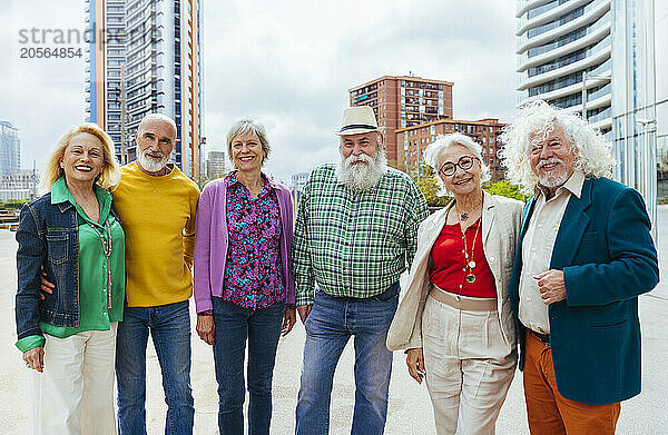 Group of happy senior friends in city