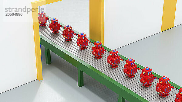 Red robots on conveyor belt in factory