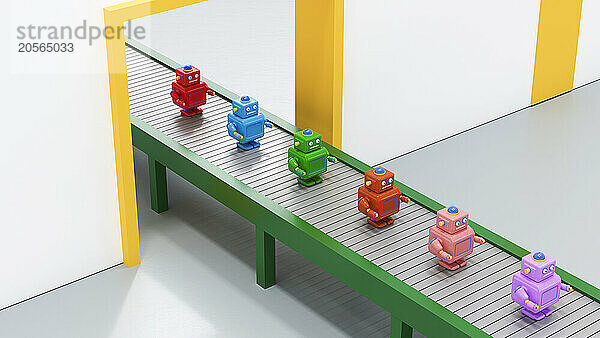 Row of colorful robots on conveyor belt in factory