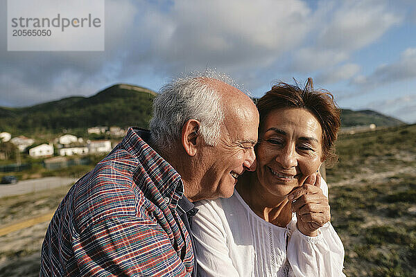 Happy loving couple on sunny day