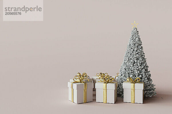 3D render of Christmas tree with gifts against pink colored background