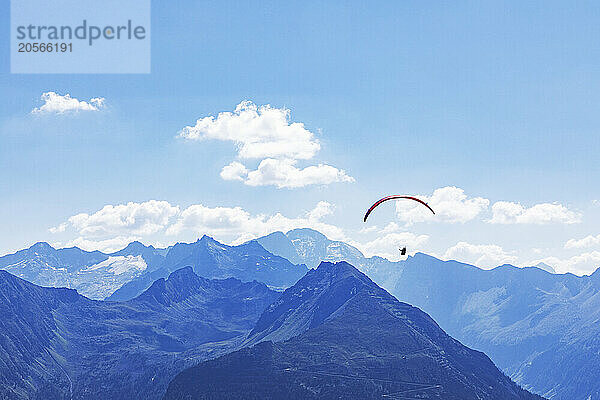 Austria  Salzburger Land  Paraglider flying over Gastein Valley