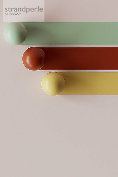 3D render of multi colored bars with spheres