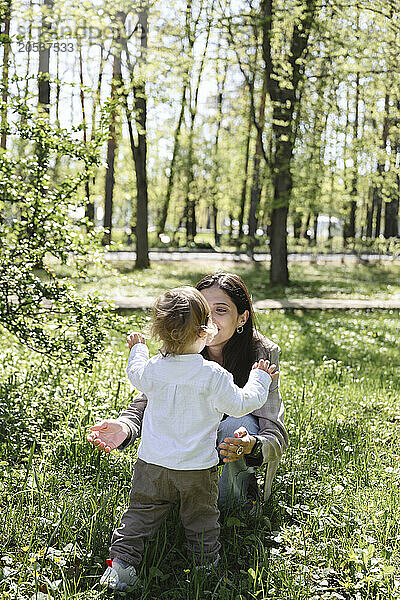 Mother and son spending leisure time in park