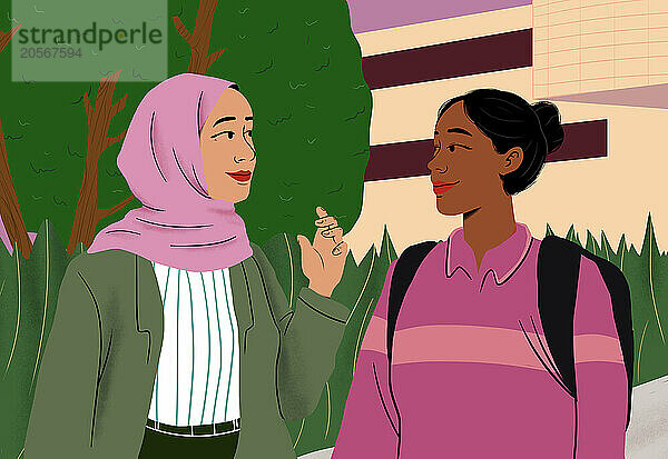 Woman in pink hijab talking with friend outside building