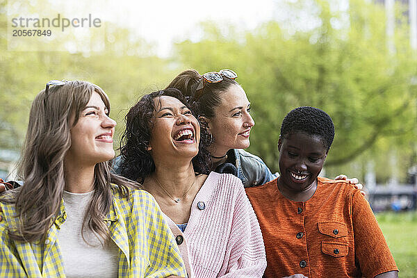 Happy multiracial friends enjoying weekend together