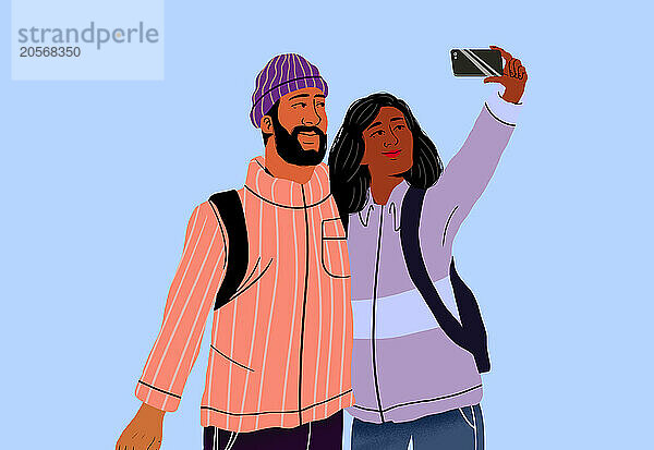 Couple taking selfie through smart phone against blue background