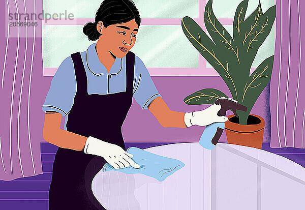 Smiling woman in apron cleaning table