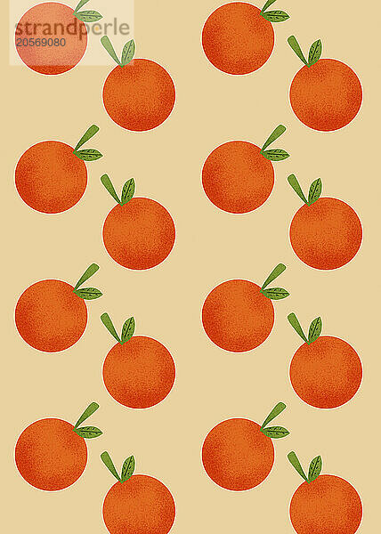 Orange fruits pattern over peach colored background