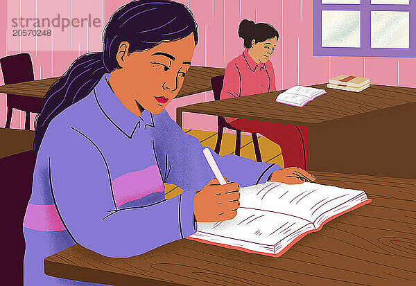 Girl writing in notebook with friend sitting at desk