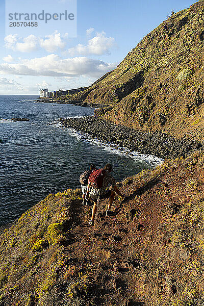 Friends hiking on Pico de Teide in Tenerife of Canary Island