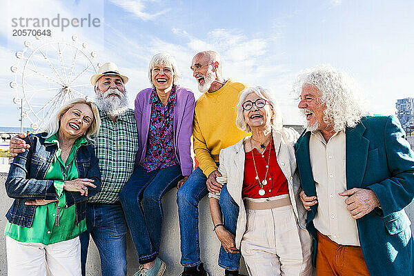 Cheerful friends on sunny day