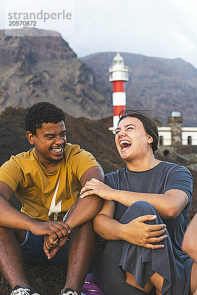 Young woman enjoying leisure time with friend at Tenerife island