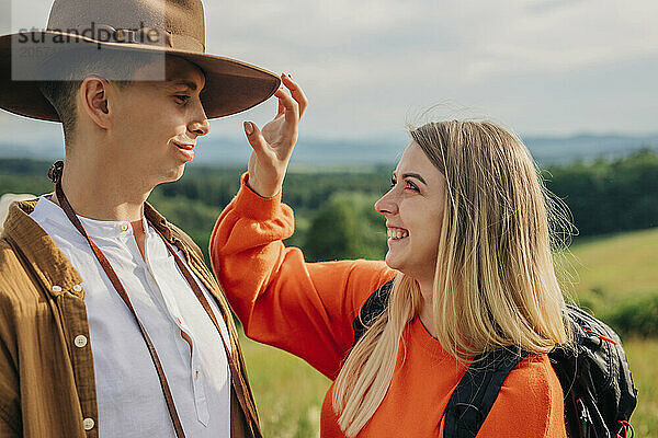 Happy woman spending leisure time with boyfriend on mountains of Poland