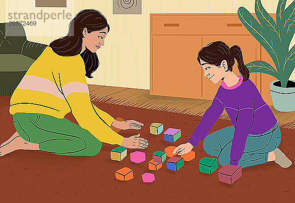 Mother and daughter playing with blocks at home