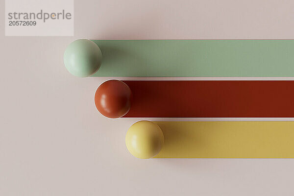 3D render of colorful bars with spheres over pink background