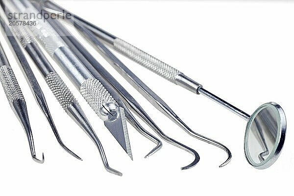 Dentists tools isolated on a white background