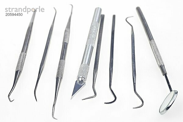 Dentists tools isolated on a white background