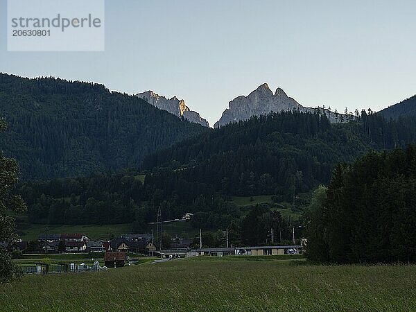 Morning light falls on mountain peak  Admonter Reichenstein  view from Gaishorn am See  Styria  Austria  Europe