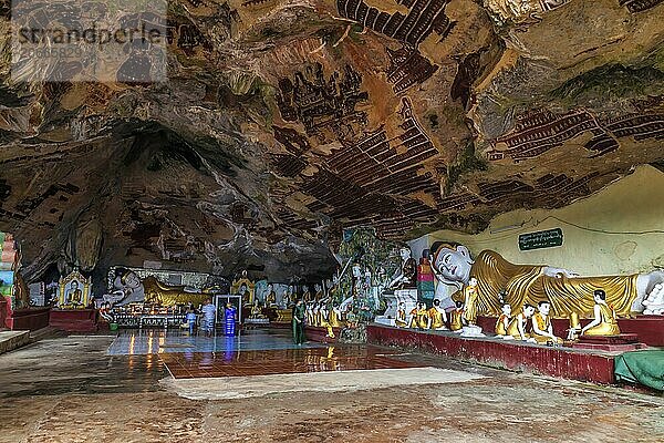 Reclining Buddha statue inside Kawgun Cave in Hpa-An  Myanmar (Burma)