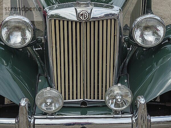 Front view of a vintage MG with distinctive radiator grille and double chrome-plated headlights  winterswijk  gelderland  the netherlands