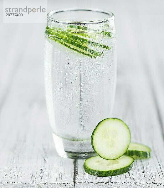 Cucumber Water on a vintage background as detailed close-up shot  selective focus