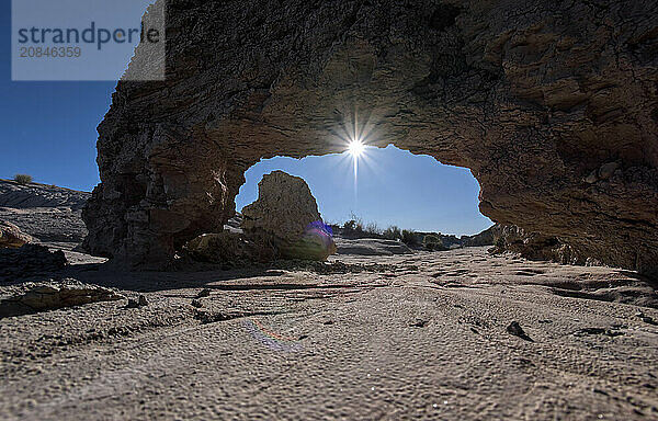 A small bentonite arch in Goblin Garden west of Hamilili Point in Petrified Forest National Park  Arizona  United States of America  North America