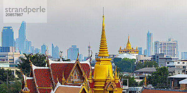 Wat Tri Thotsathep Worawihan  behind it Golden Mount and the skyline of Bangkok  Thailand  Asia