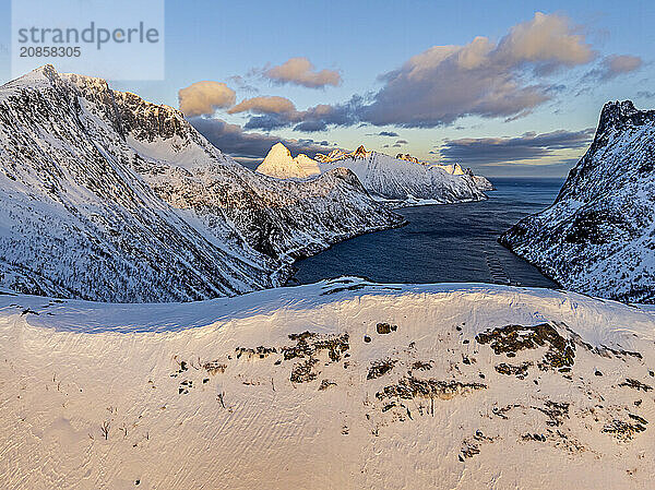 Aerial view of Bergen by the sea  coast  fjord  morning light  winter  snow  Senja  Troms  Norway  Europe