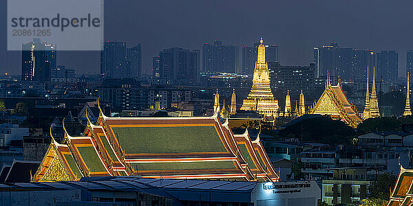 Panorama from Golden Mount to the illuminated Wat Ratchabophit  Wat Rachapradit  Wat Pho and Wat Arun  Bangkok  Thailand  Asia