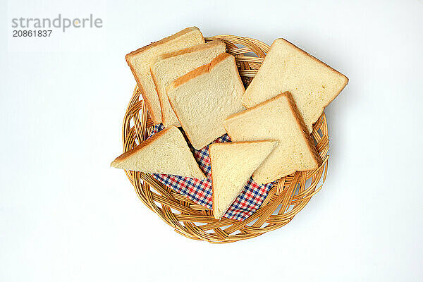 Slices of toast in baskets  unroasted