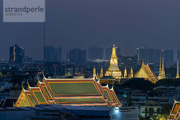 Panorama from Golden Mount to the illuminated Wat Ratchabophit  Wat Rachapradit  Wat Pho and Wat Arun  Bangkok  Thailand  Asia