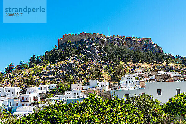 View of the town and acropolis of Lindos in Rhodes