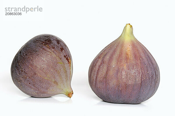 Real fig or fig tree (Ficus carica)  ripe figs against a white background