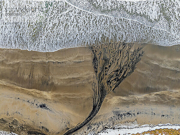 Aerial view of beach and sea  waves  spray  coast  river  Senja  Troms  Norway  Europe