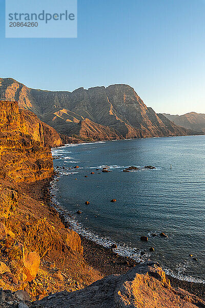 Cliffs and the coast of Agaete at summer sunset in Gran Canaria. Spain