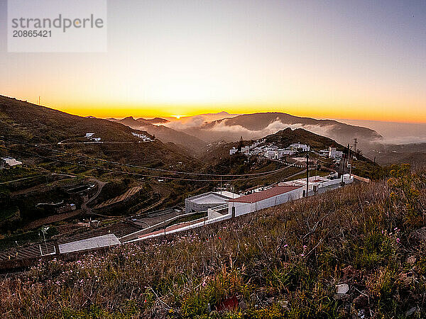 Sunset near Roque Nublo in Gran Canaria and Tenerife in the background  Canary Islands