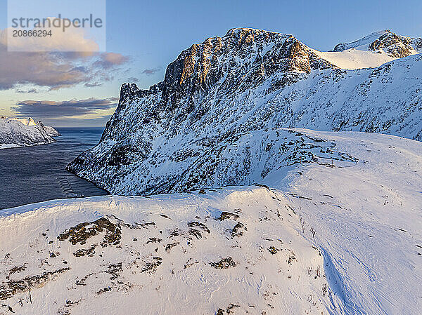 Aerial view of Bergen by the sea  coast  fjord  morning light  winter  snow  Senja  Troms  Norway  Europe