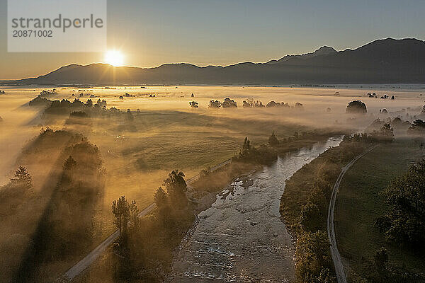 Aerial view  river with fog in front of mountains  sunrise  backlight  summer  Loisach  Alpine foothills  Bavaria  Germany  Europe