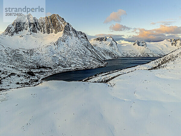 Aerial view of Bergen by the sea  coast  fjord  morning light  winter  snow  Senja  Troms  Norway  Europe