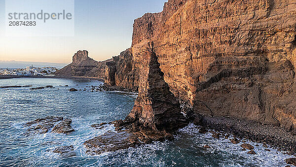 Aerial view of Agaete cliffs at summer sunset in Gran Canaria. Spain