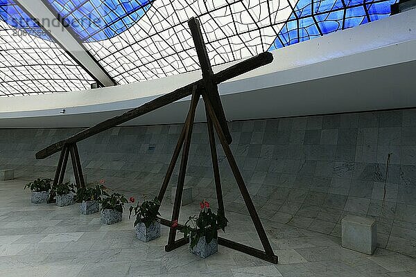 Historic cross installed for the inauguration of the new capital in 1957  Roman Cathedral of Brasilia or Metropolitan Cathedral of Our Lady of Aparecida  designed by Oscar Niemeyer  World Heritage Site  Brasilia  Federal district  Brazil  South America