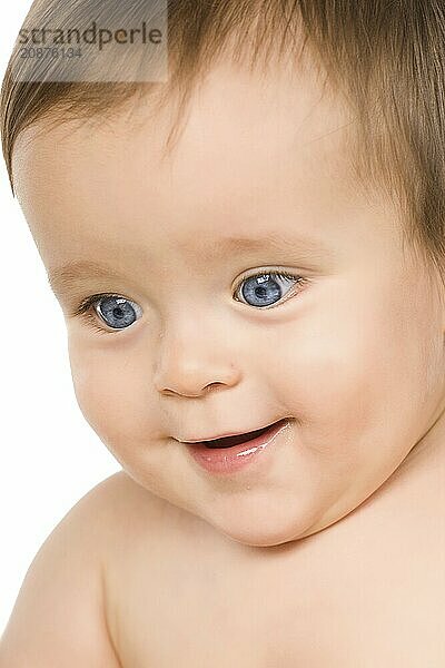 The blue-eyed baby  close-up. Isolated on white