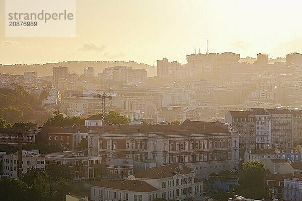 View of Lisbon famous view from Miradouro da Senhora do Monte tourist viewpoint in contre-jou on sunset. Lisbon  Portugal  Europe