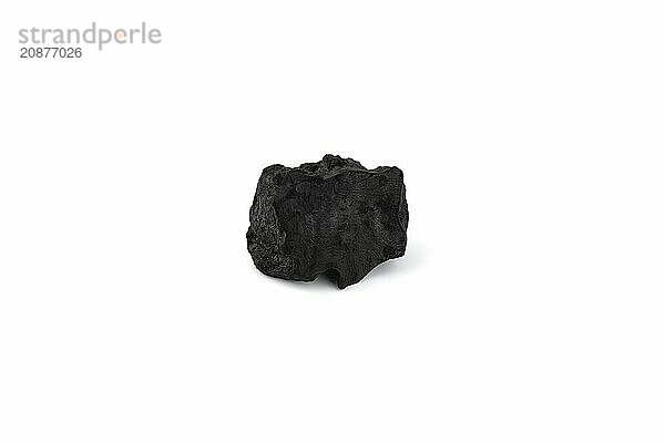 Natural wood charcoal isolated on white background. Pile of coal isolated on white background