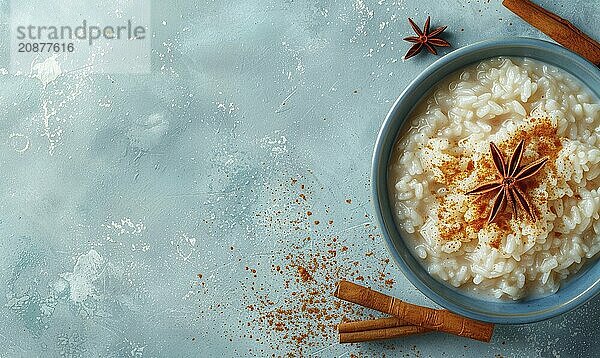 Puerto Rican arroz con dulce with cinnamon on a light blue background AI generated