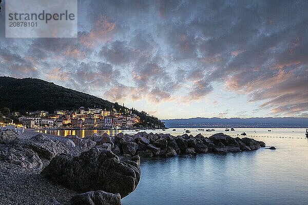 Beautiful historic skyline of a village on the Mediterranean  taken in the morning at sunrise on the beach and by the sea. Dreamlike harbour landscape in Mošcenicka Draga  Moscenicka Draga  Istria  Croatia  Europe